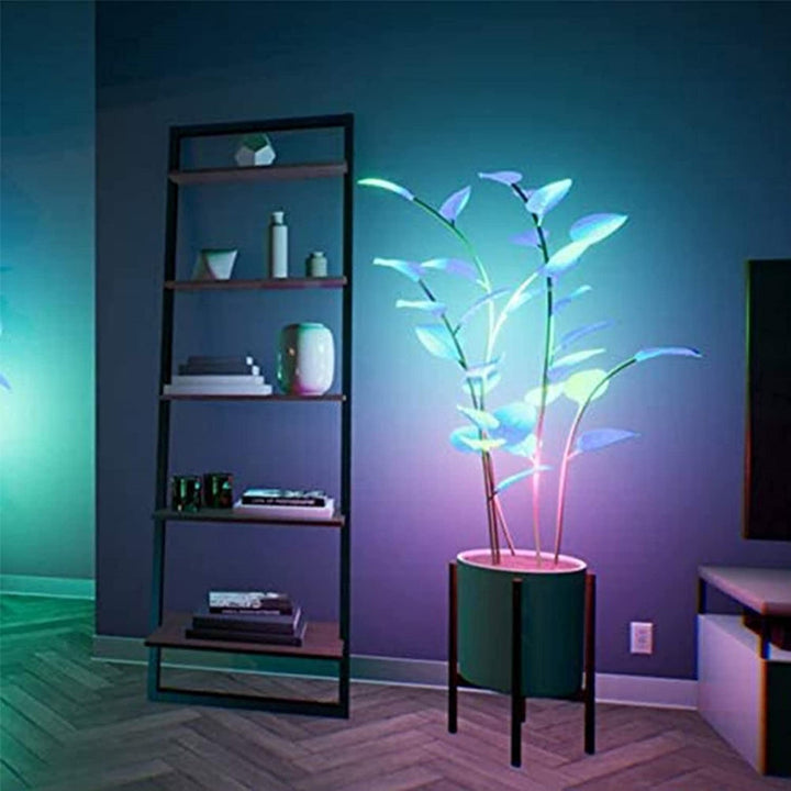 Programmable ambient illumination desk lamp functioning as a smart indoor plant light