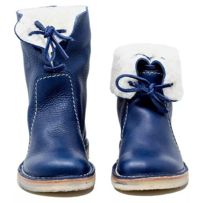 Lifestyle shot of trendy ankle boots worn during a crisp autumn walk