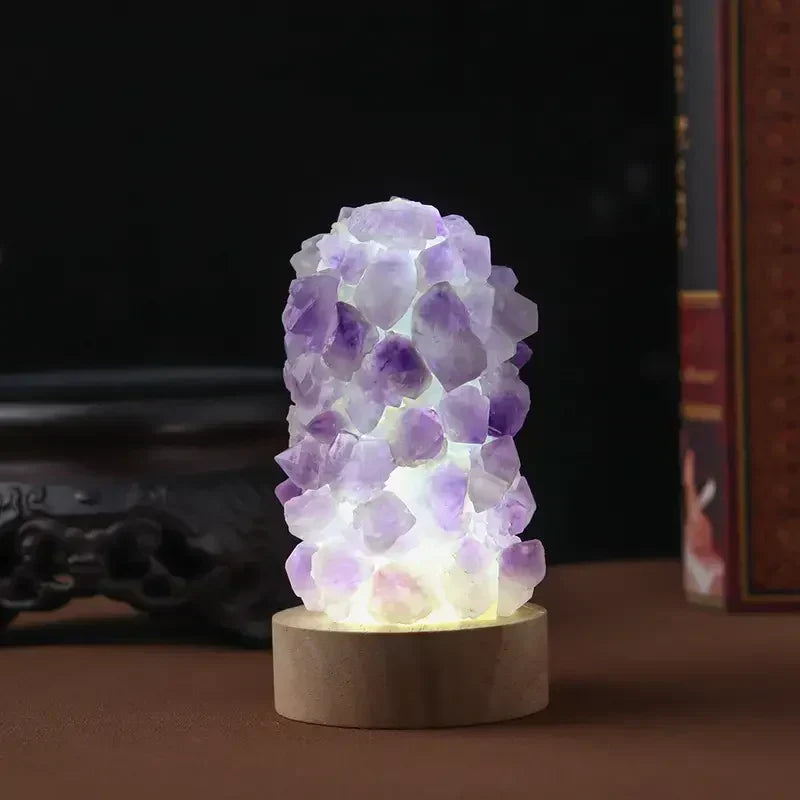Single lit amethyst crystal lamp showcasing its illumination