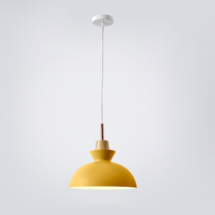 Modern ceiling lamp turned on in a dimly lit contemporary bedroom
