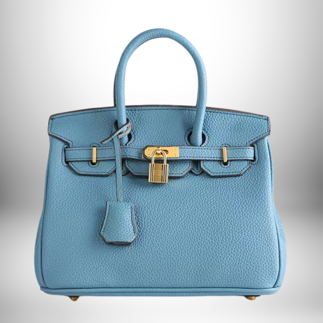Model holding the women's fashion accessory bag for casual daywear