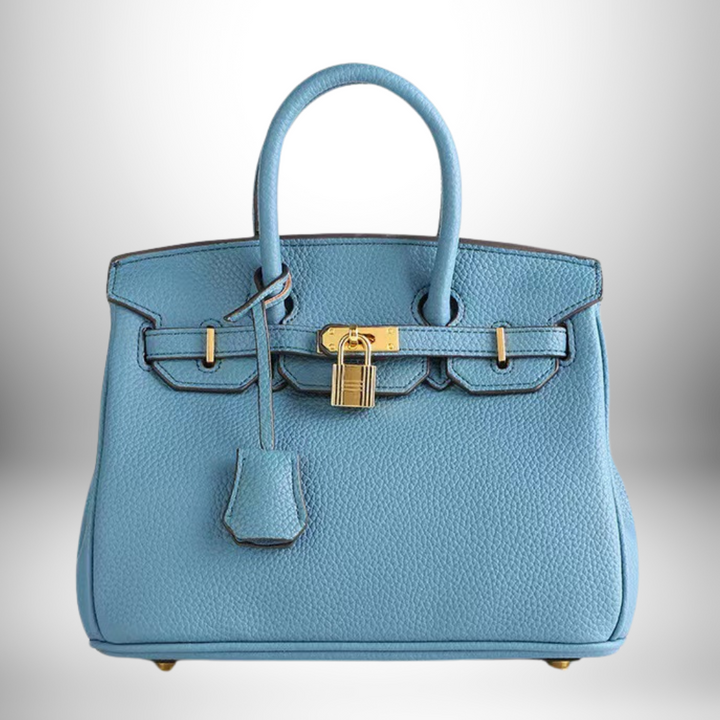 Model holding the women's fashion accessory bag for casual daywear