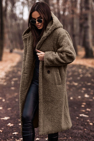 Beige women's hooded winter coat featuring front zipper and cozy pockets