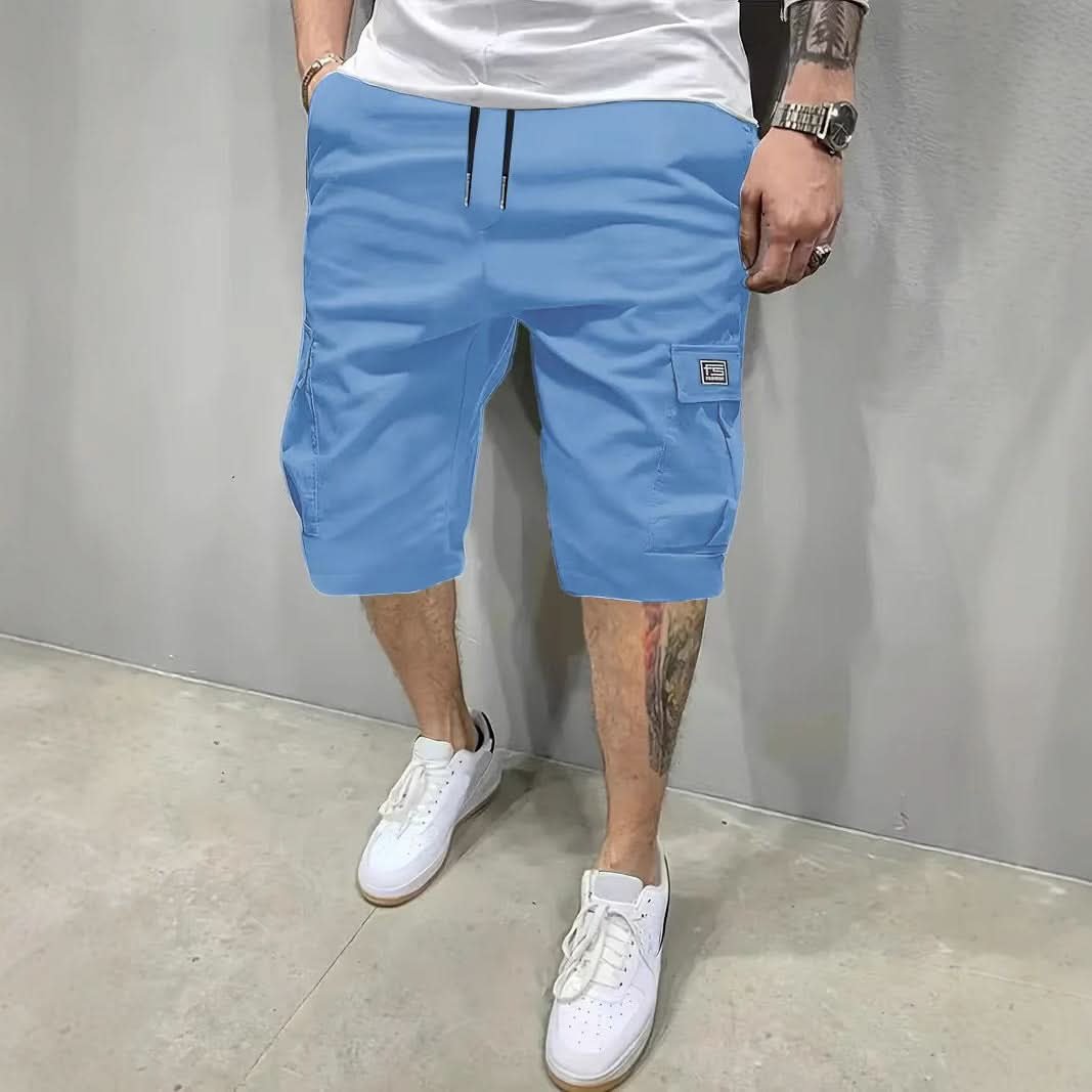Man wearing bright blue casual utility shorts for summer wear