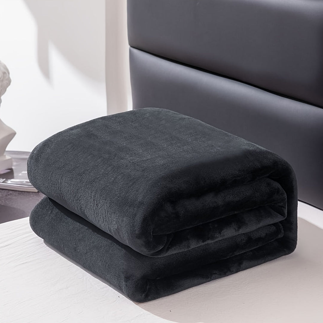 High-quality flannel blanket focusing on smooth fabric and cozy aesthetics
