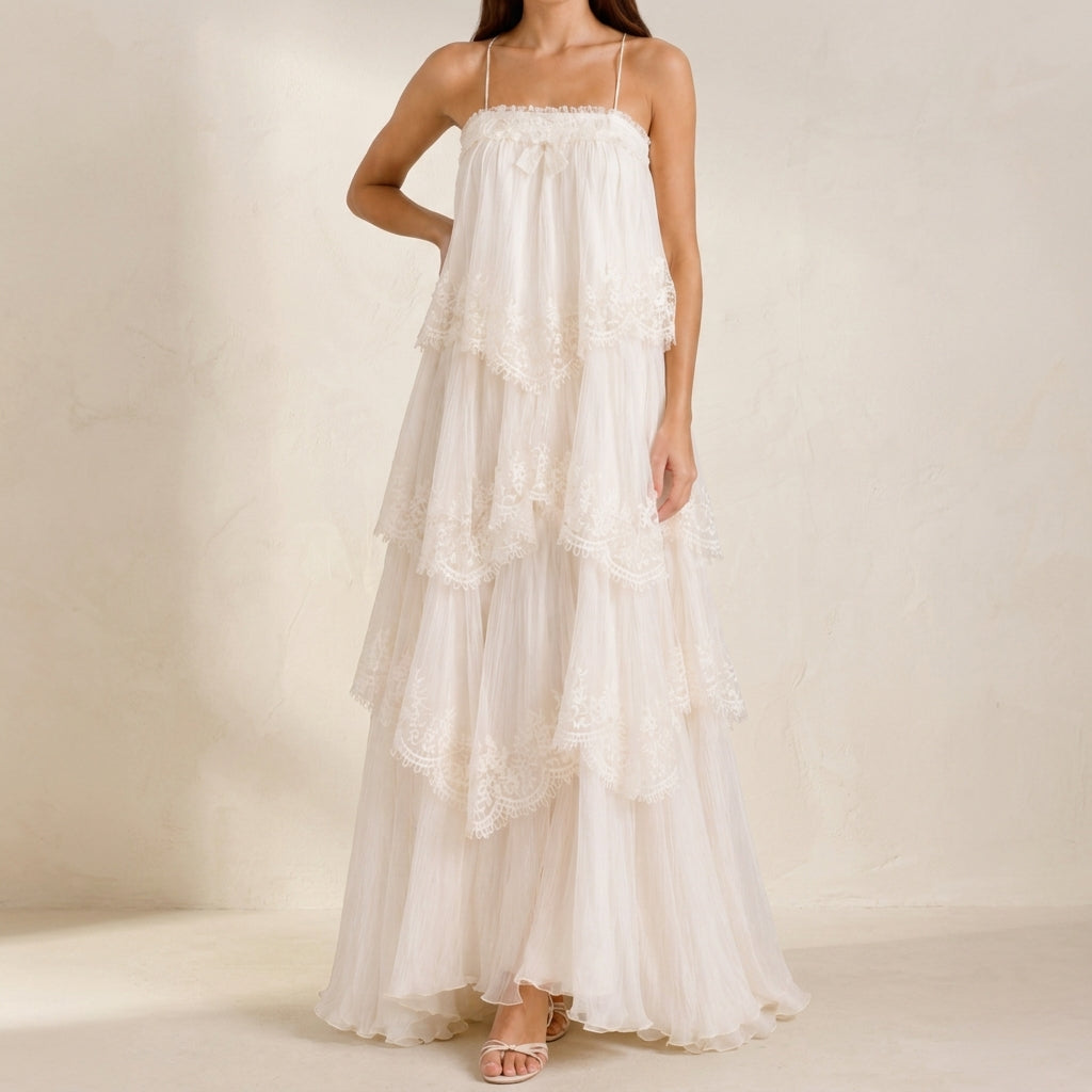 Model wearing Sienna women's ruffled tiered sleeveless maxi dress in white