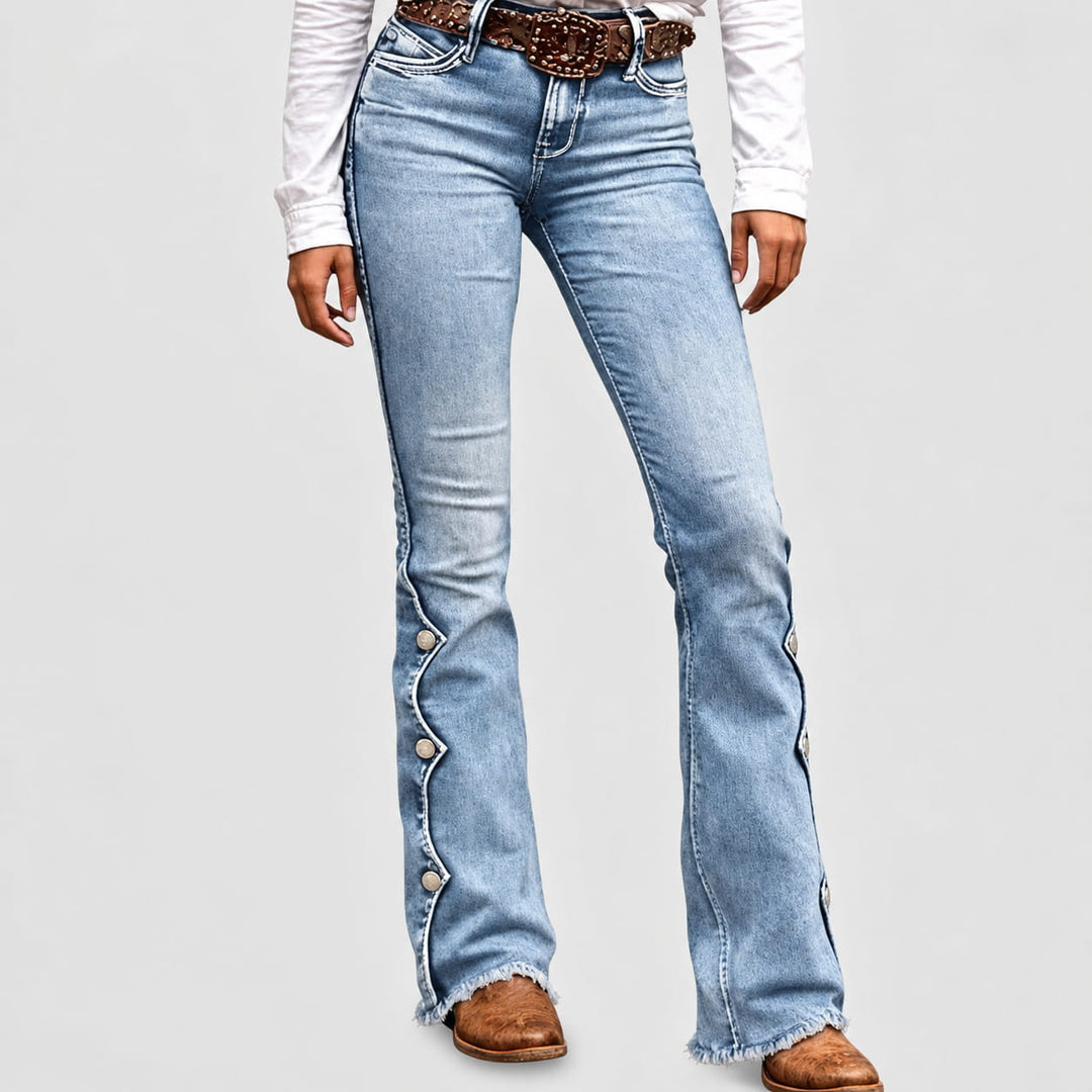 Side profile of women's trendy flare denim pants highlighting the high rise waist.