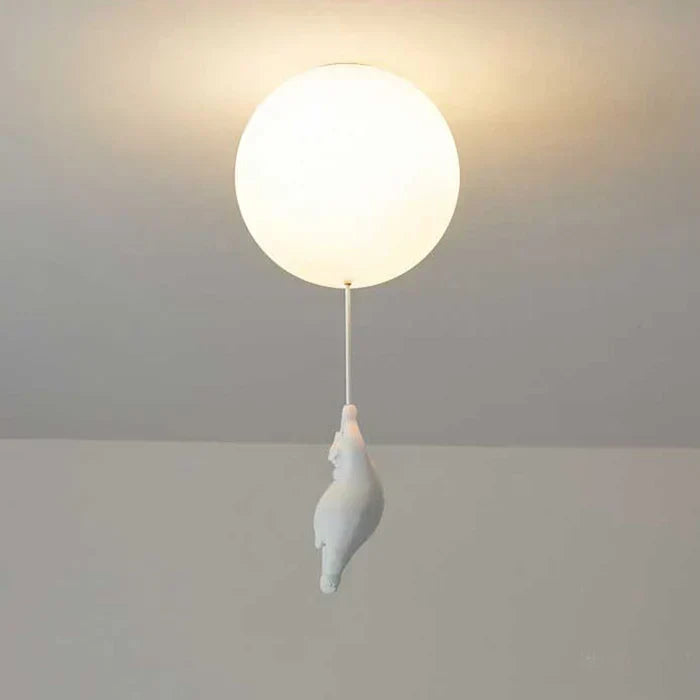 Detailed shot of the acrylic shade on the bear and balloon ceiling lamp