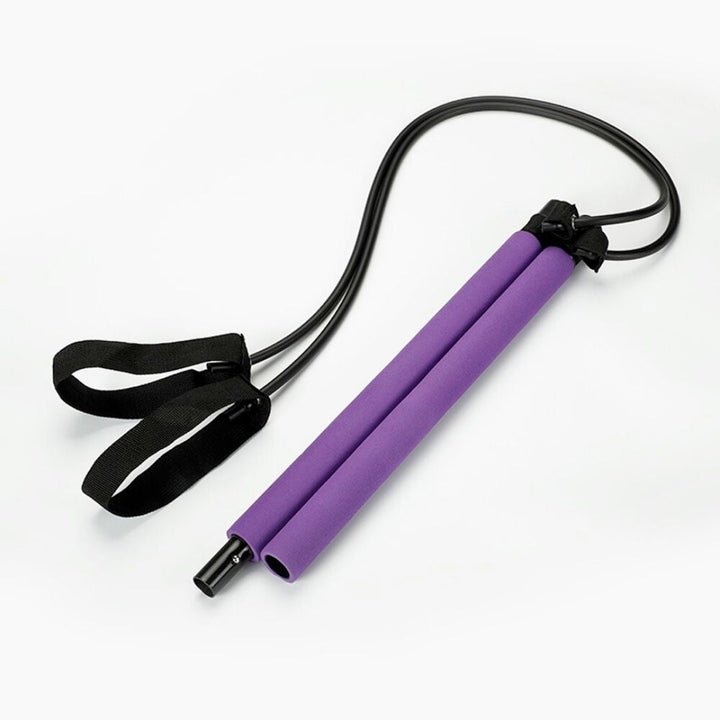 User performing core strengthening exercise with the stretching Pilates bar