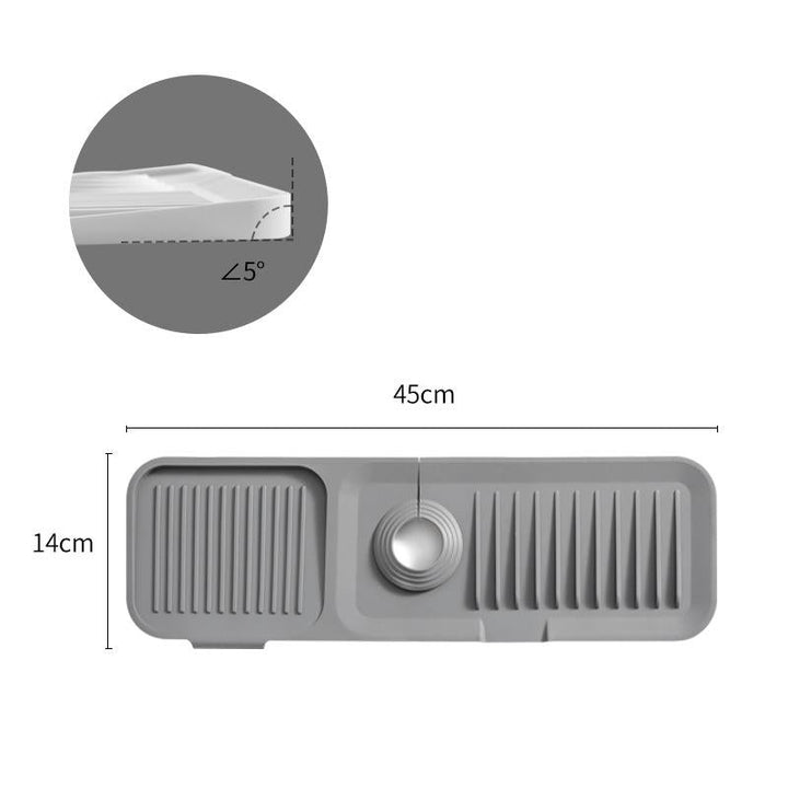 Grey silicone dish drying mat blending into kitchen decor