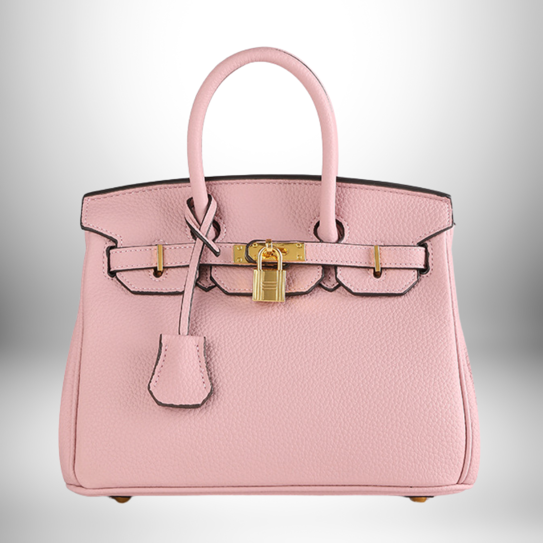 Lifestyle view of the luxury purse paired with professional attire