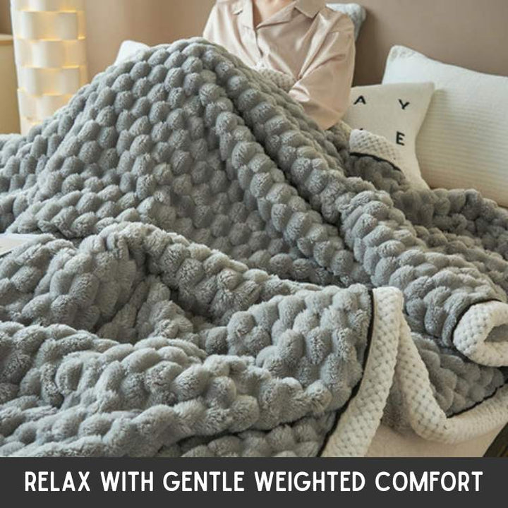 Close-up view of breathable fabric and durable stitching on a relaxation throw