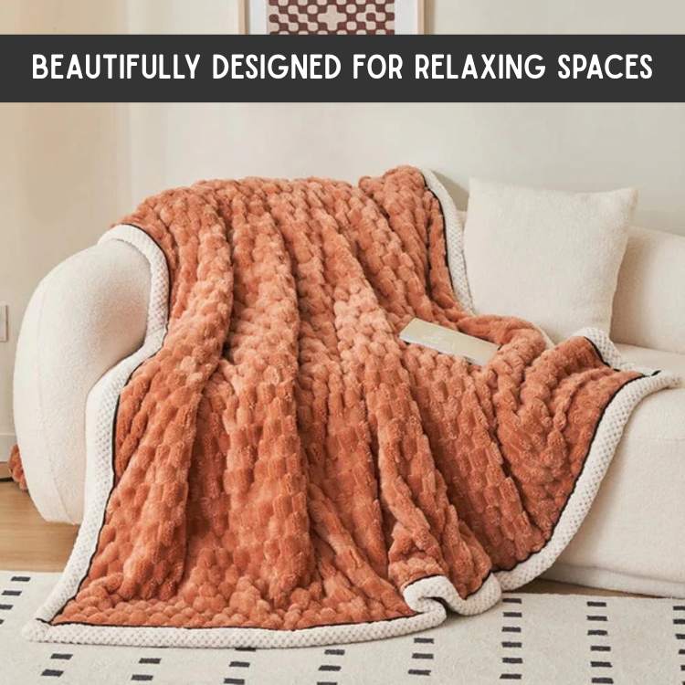 Soft grey weighted blanket folded neatly showcasing plush cozy bedding texture
