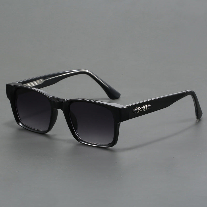 Classic retro sunglasses paired with casual wear for a chic vintage look