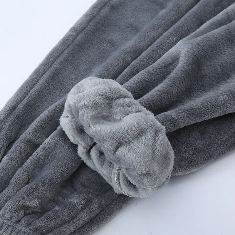 Folded stack of men's warm winter pyjamas ready for gifting