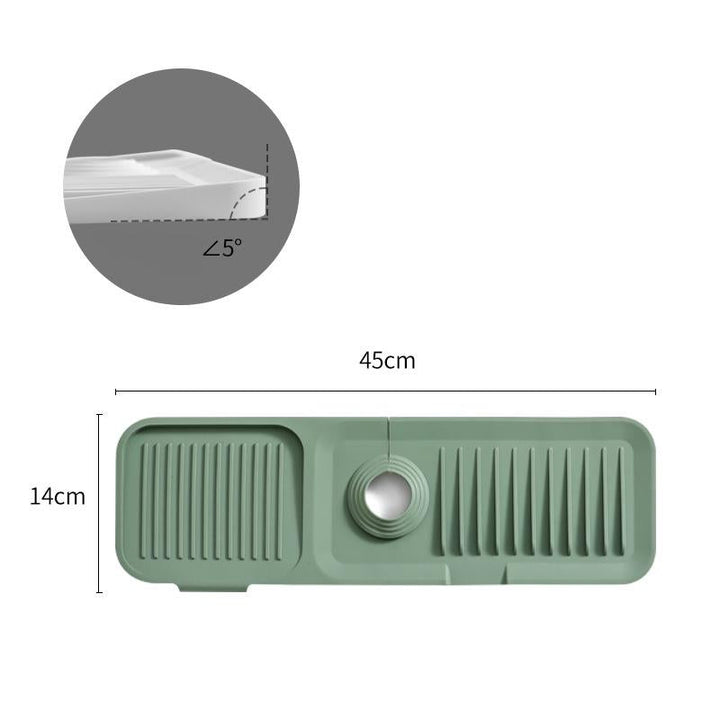 Heat resistant silicone dish drying mat holding a steaming pot