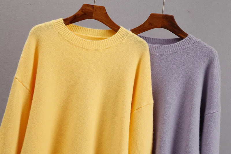 Laid-flat view of the green women's oversized jumper and knit pullover