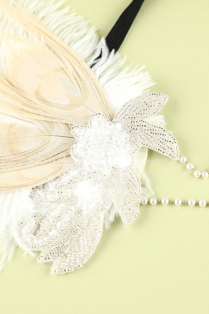 Charleston accessory feathered headwear showing side profile of a 1920s headband