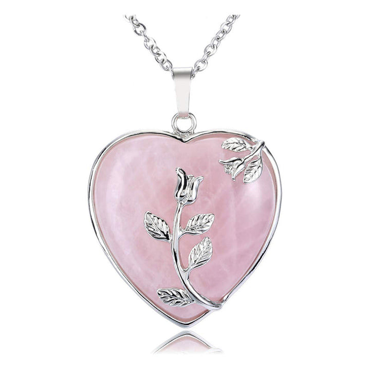 Detailed shot of the crystal heart pendant and secure silver clasp