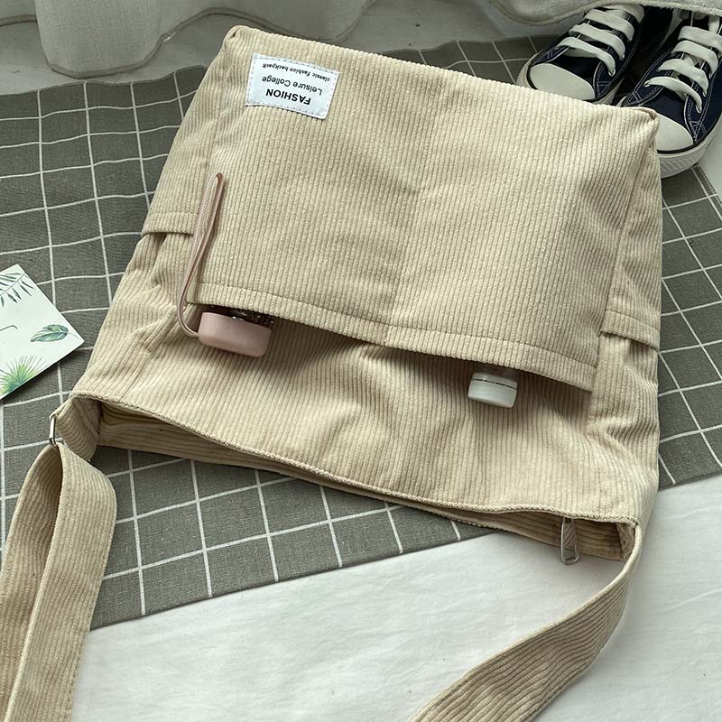 Brown corduroy handbag with spacious compartments