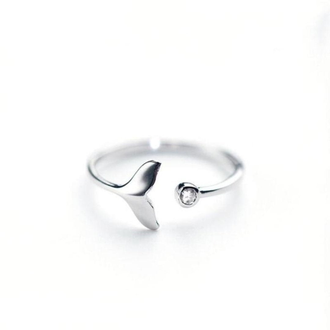 Front view of maritime inspired dolphin tail ring with adjustable band
