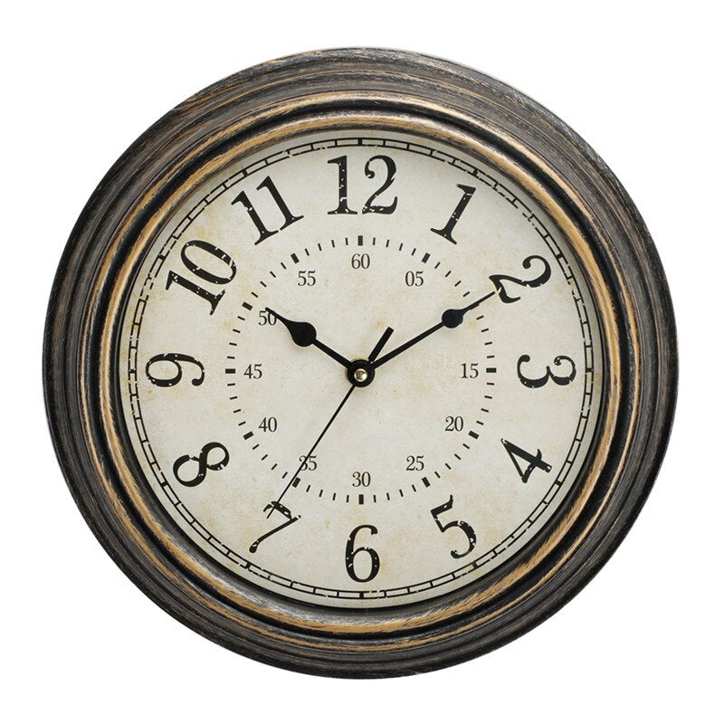 Close-up view of the vintage wood-look wall clock face with classic numerals