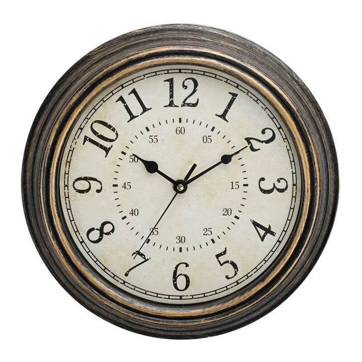 Close-up view of the vintage wood-look wall clock face with classic numerals