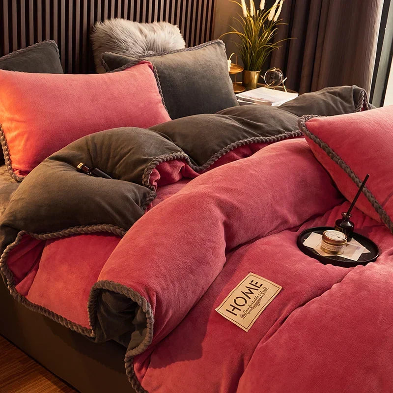 Plush fleece duvet set in dark pink with cozy pillows arranged on a bed