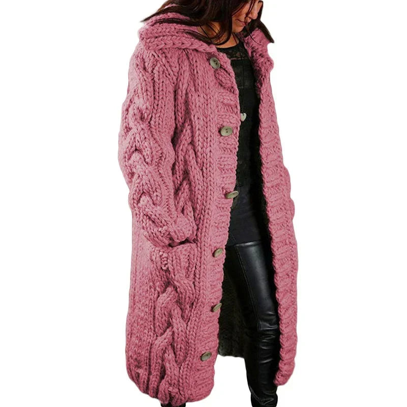 Close-up view of the pink chunky knit cardigan with buttons