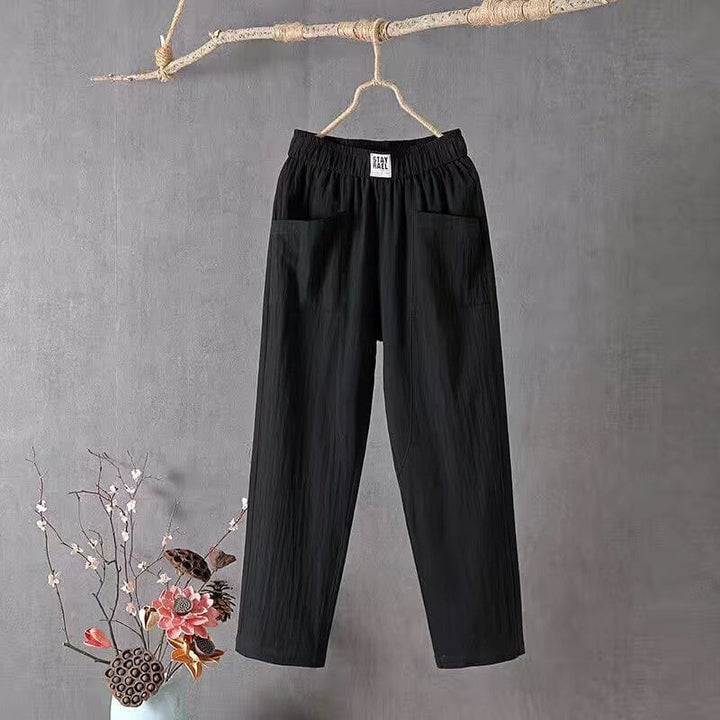 Detailed shot of functional side pocket on women's lightweight pants