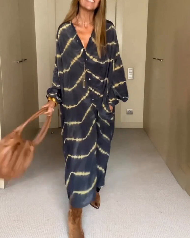 Full-length view of the black maxi dress with chic pattern