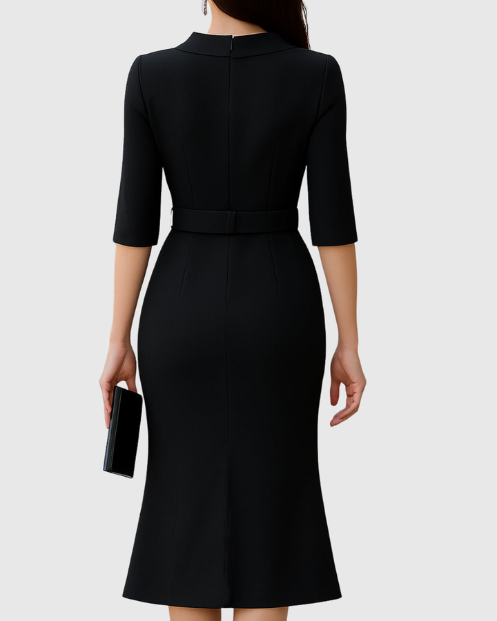 Back view of women's black belted midi dress showing tailored fit and midi length