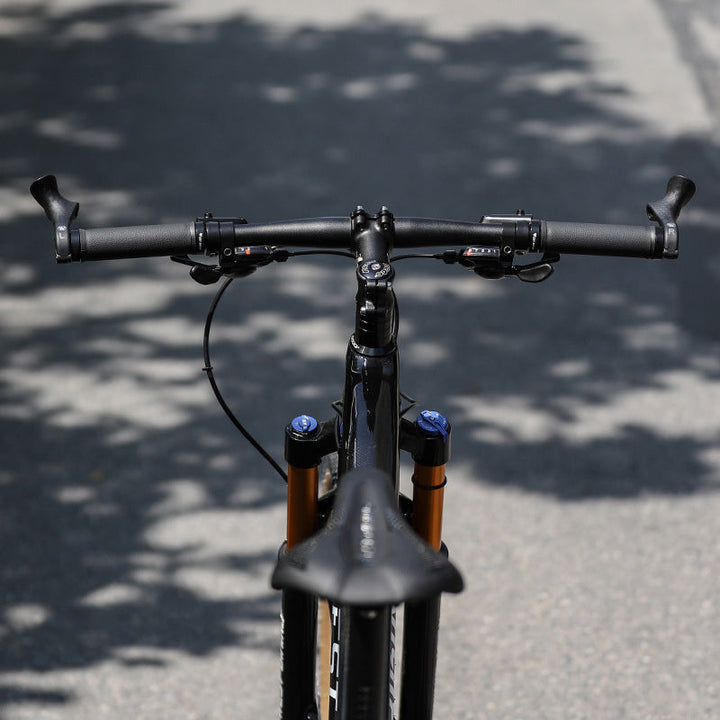 Top down view of bicycle handlebars equipped with grips