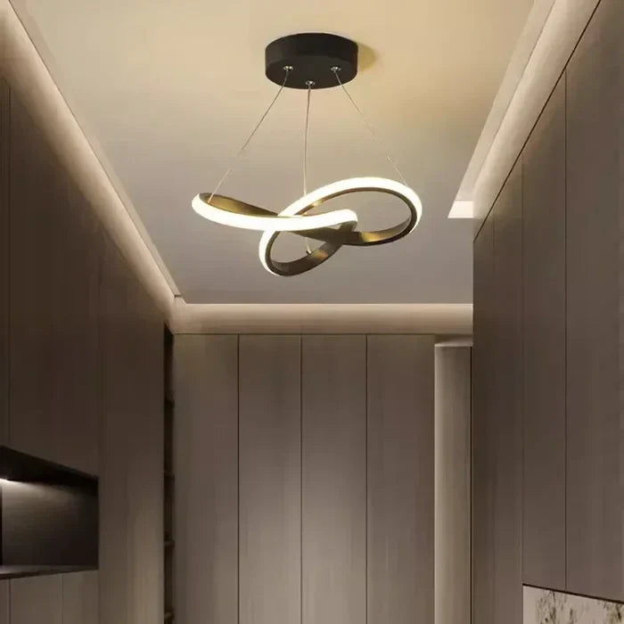 WaveGlow black modern LED ceiling light installed in a contemporary hallway