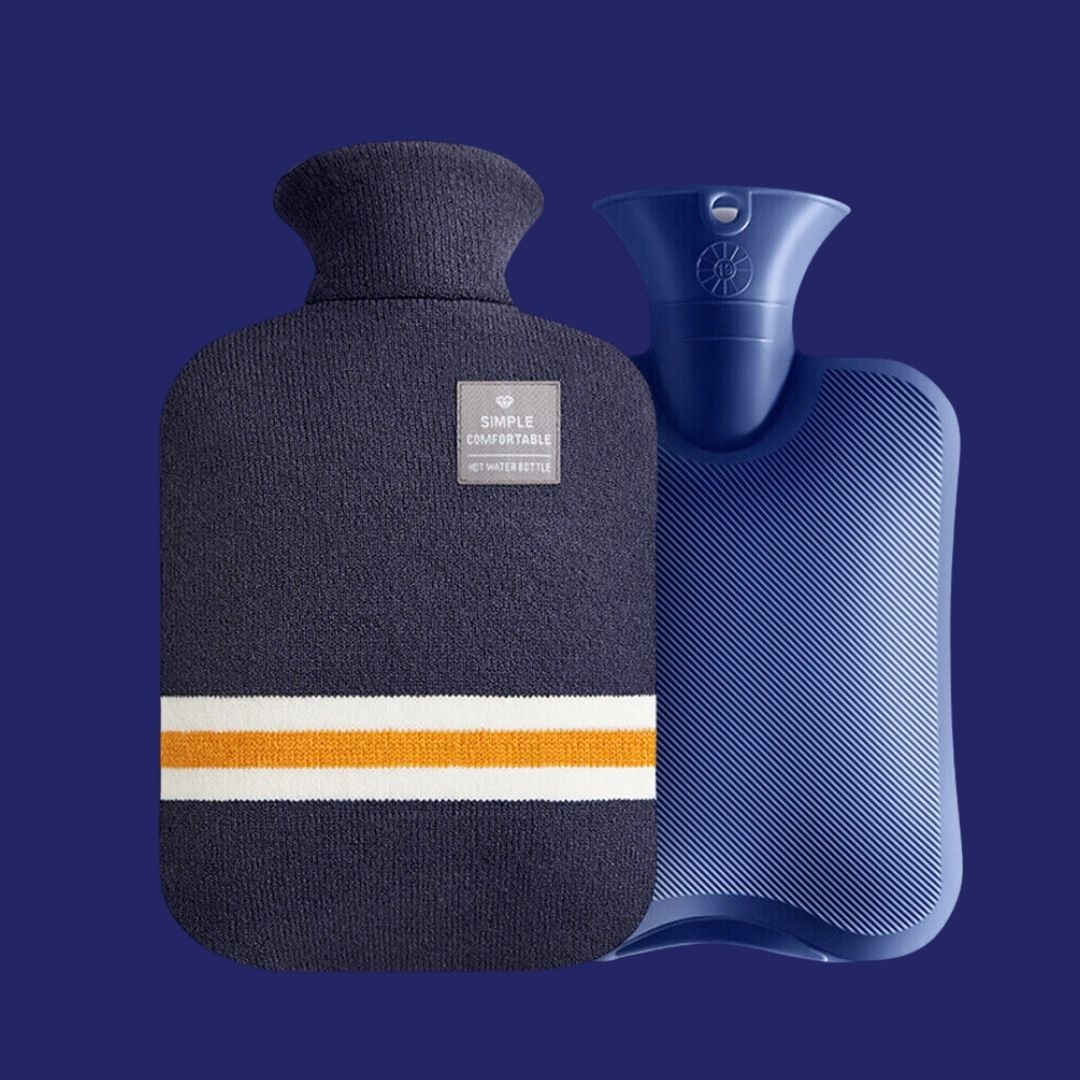 Dark blue hot water bag alongside its knitted cover showing a striped design.