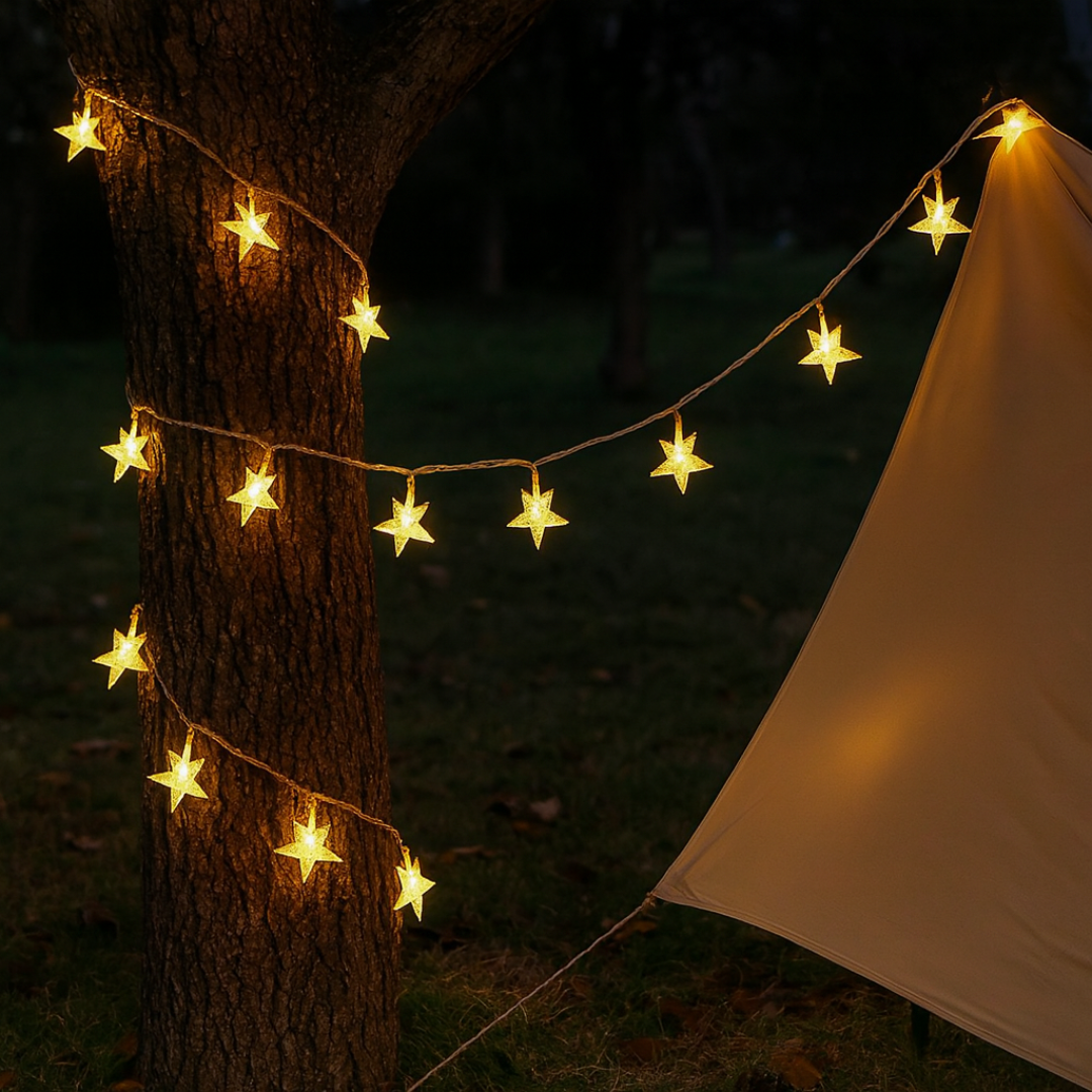 StarLuma LED fairy lights glowing on a tree trunk outdoors at night