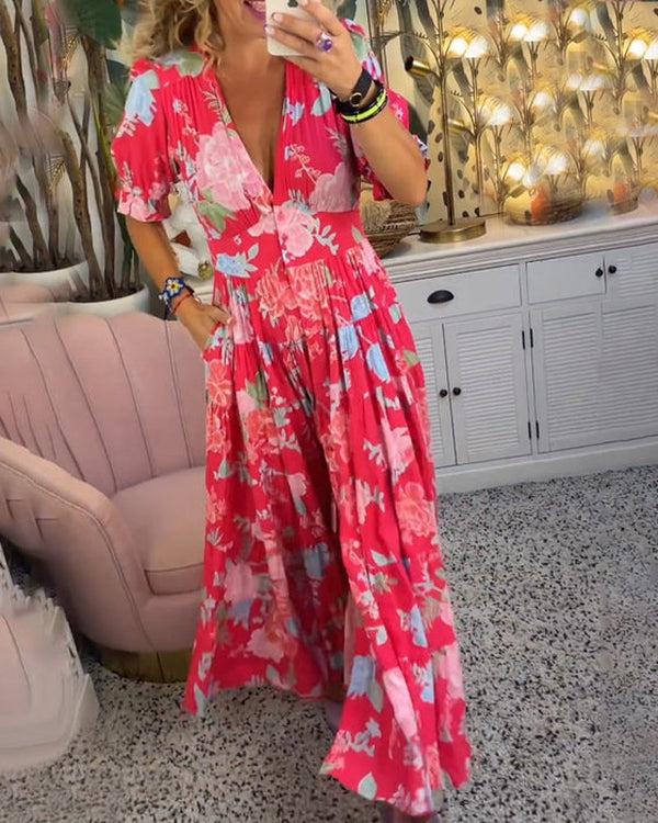 Back view of the elegant women's floral dress showing the maxi length