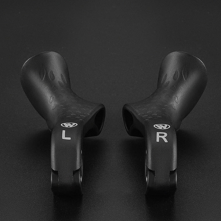 Close-up of bike ergonomic grips showing anti-slip texture and palm rest