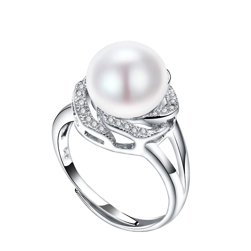 Sterling silver statement ring with large white freshwater pearl and accent stones