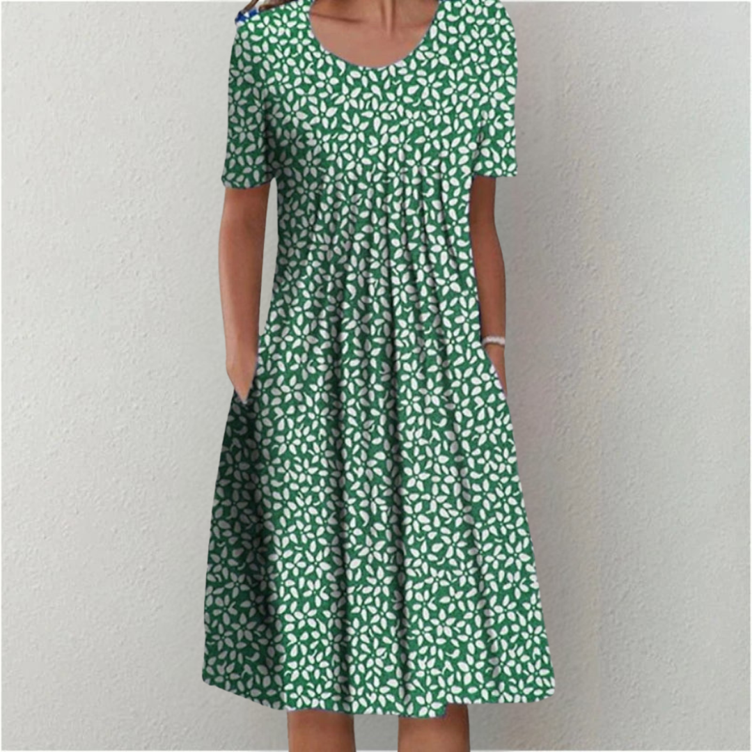 Womens floral midi dress styled with short sleeves for effortless warm-weather looks.