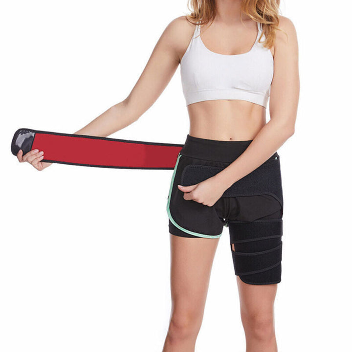 Model demonstrating how to secure the adjustable hip support wrap