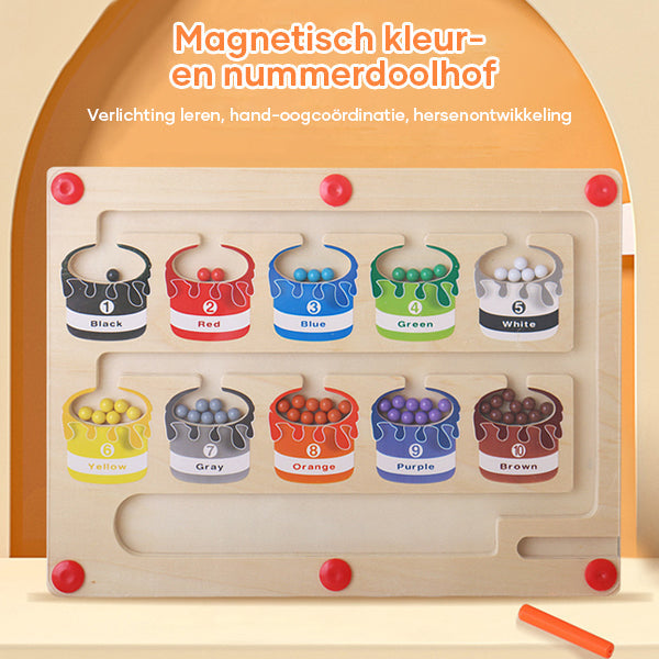 Child playing with wooden magnetic maze travel toy, engaging in educational play