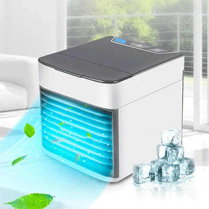 Overhead view of the mini cooler and ventilator packaged neatly with accessories