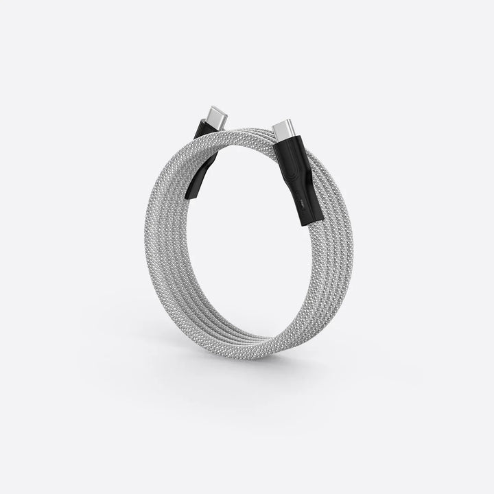 Person effortlessly connecting smartphone to magnetic charging cable