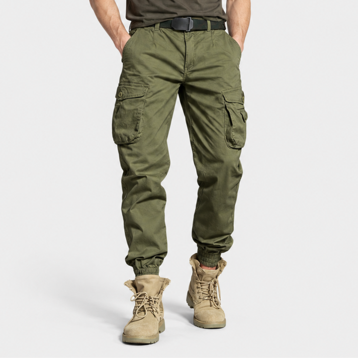 Side profile of men's tactical cargo trousers featuring deep utility pockets