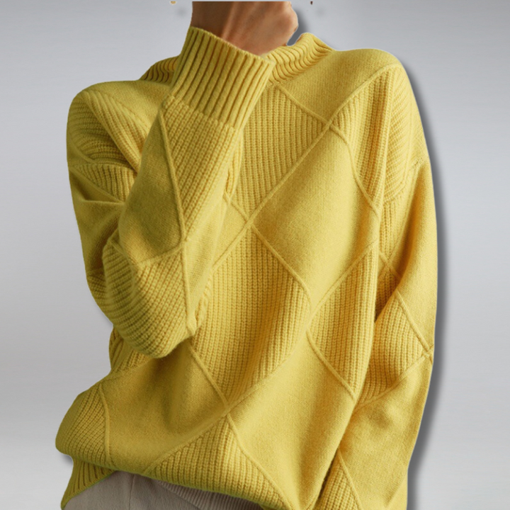 Woman wearing a yellow turtleneck knit sweater with detailed ribbing