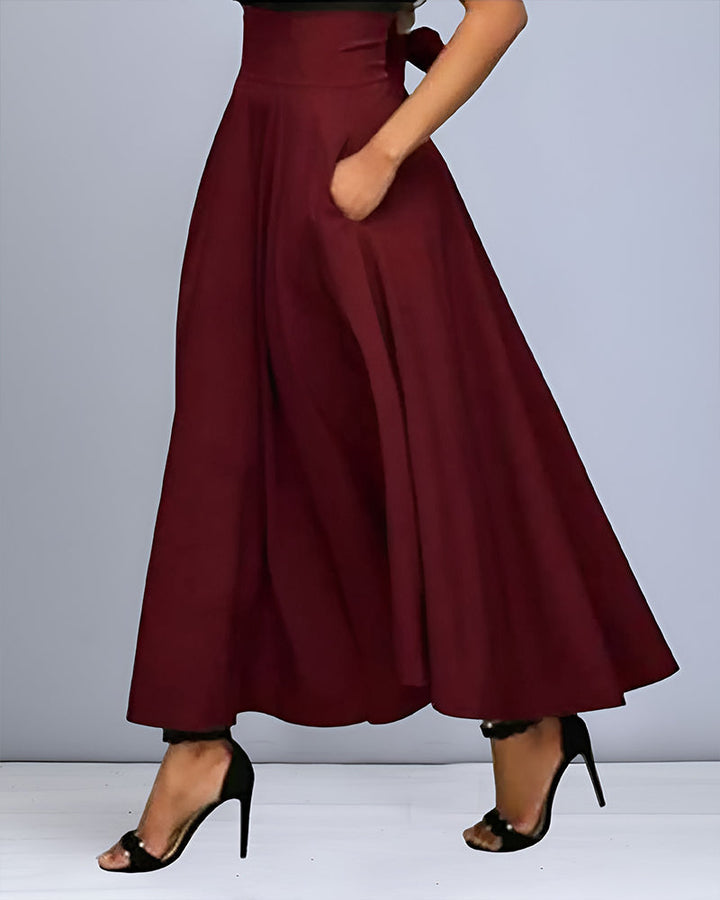 Chic women's skirt with high waist design and smooth midi drape