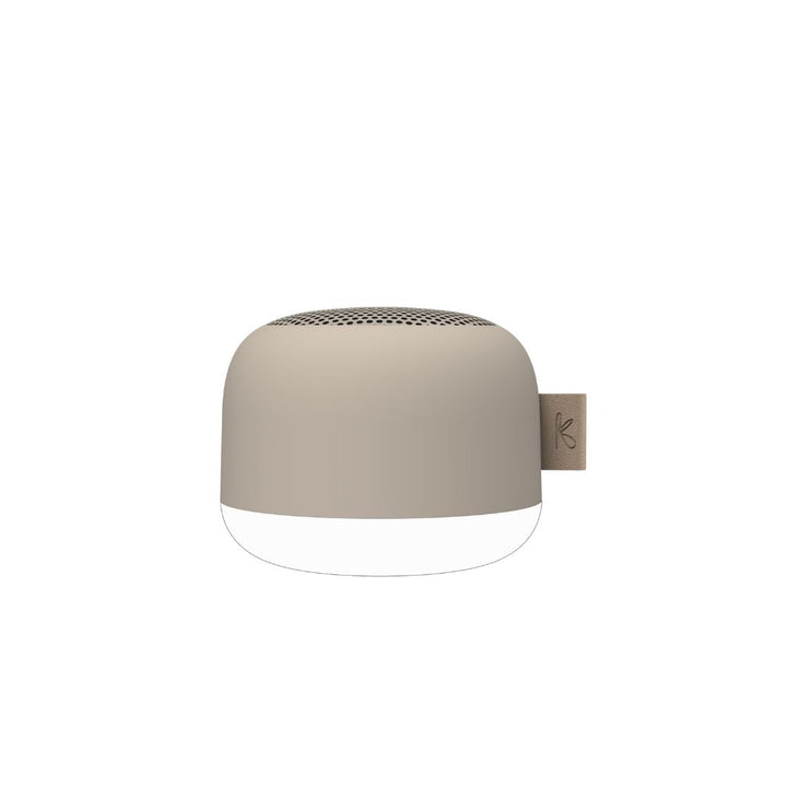 Back view of the portable shower speaker with charging port protective flap