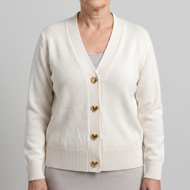 Women's knit cardigan featuring cute heart buttons in a cozy fall style