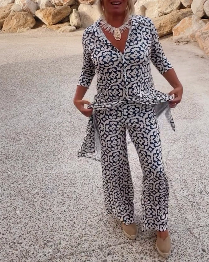 Back view of women's printed tunic and wide-leg pants matching set